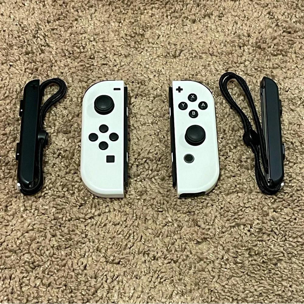 Nintendo Switch White OLED Joy-Cons with side straps